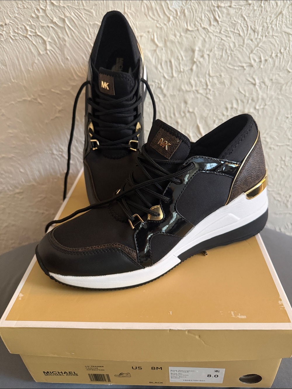 Michael Kors Black and Gold Wedge Sneakers
